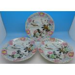 Three oriental plates,