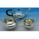 A three piece silver tea service, Birmingham 1913,