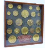 A collection of twenty gilt metal medallions awarded to Walker & Hall Limited,