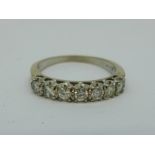 An 18ct gold, seven stone diamond ring, 3.