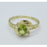 A 9ct gold, peridot and diamond ring, 1g,