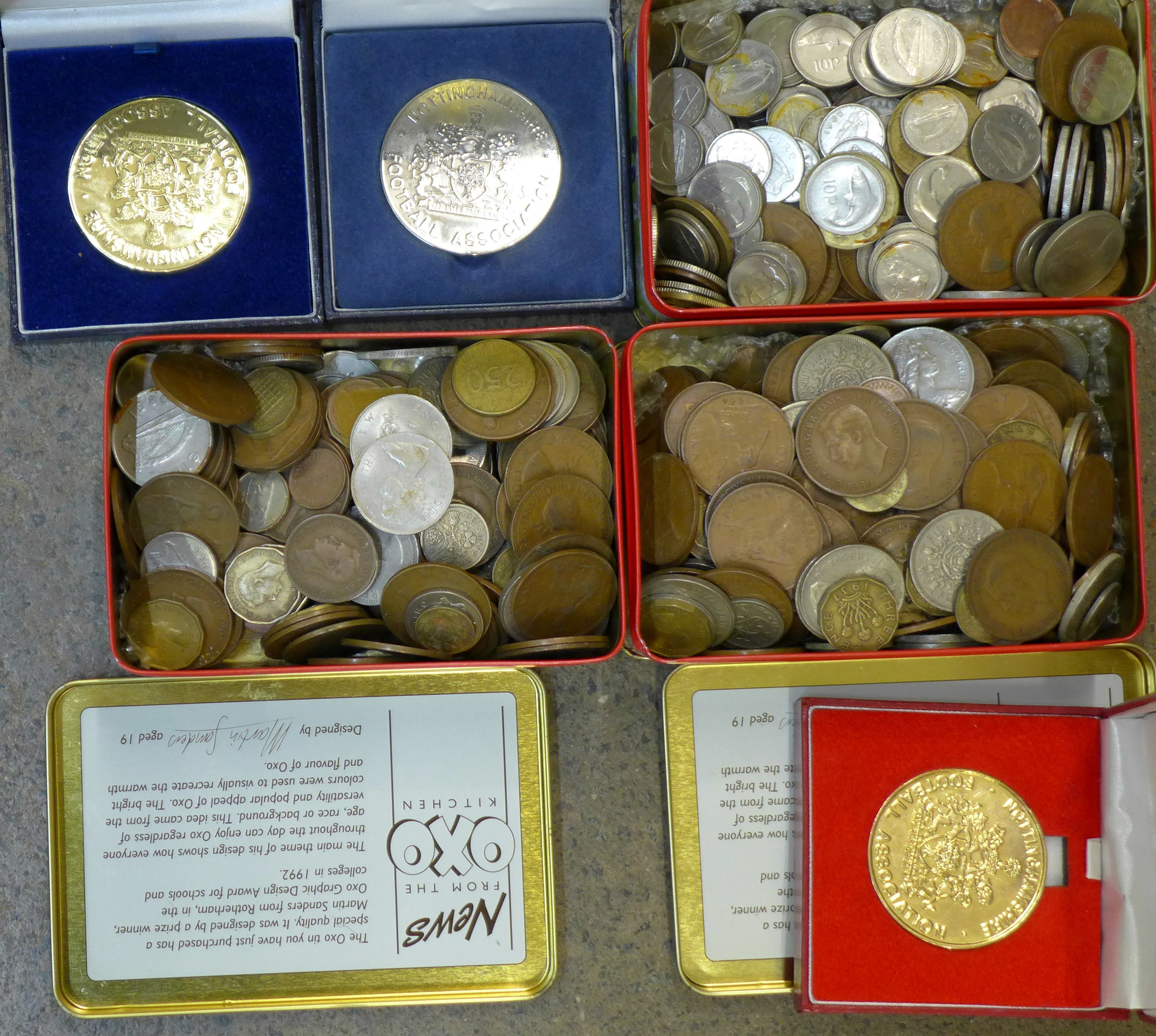 Three tins of coins and three Football Association medallions, 4.