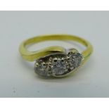 An 18ct gold, three stone diamond ring, 0.50cts stamped on shank, 4.