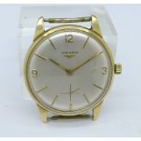 A 9ct gold Longines wristwatch, case back bears inscription dated 1974,
