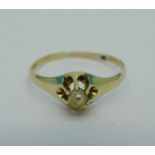 A 14k gold and pearl ring, 1.
