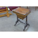 A Victorian inlaid burr walnut sewing table