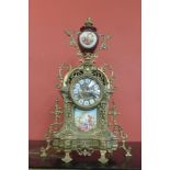 A French style gilt metal and porcelain mantel clock