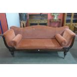 A William IV rosewood and upholstered settee
