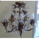 A gilt metal five branch chandelier