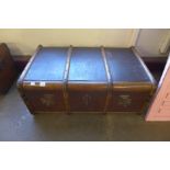 A banded steamer trunk