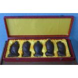 A set of five Chinese carved hardwood Buddhas,