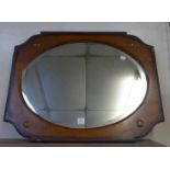 An oak framed mirror