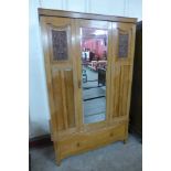 An Edward VII oak wardrobe