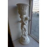 A 1960's Italian style ceramic figural jardiniere and stand