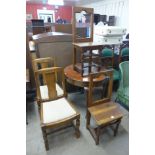 A pair of joined oak child's correction chairs,