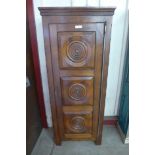 A French Bretton oak livery cupboard