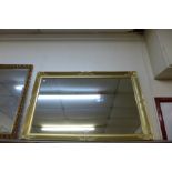 A gilt framed mirror