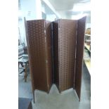 A wicker effect folding dressing screen