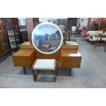 A Uniflex teak dressing table and stool