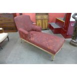 A Victorian walnut and upholstered day bed