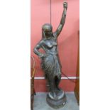 A large bronzed figural Cleopatra lamp stand,