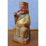 A Chinese polychrome figure of a seated Emperor
