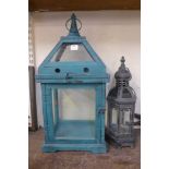 Two metal lanterns