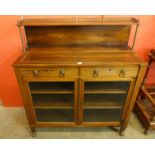 A Regency inlaid rosewood chiffonier