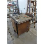 A work bench with band saw