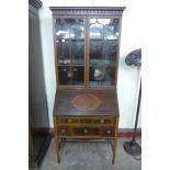 An Edward VII inlaid mahogany bureau bookcase