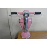 A pink Vespa table lamp