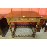 A 17th Century style oak side table on barleytwist legs