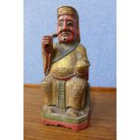 A Chinese polychrome figure of a seated Emperor