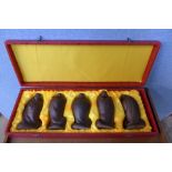 A set of five Chinese carved hardwood Buddhas,