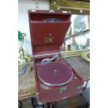 A HMV red table top gramophone