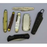 Six penknives including one advertising, Dalzell & Co. Ltd.