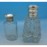 Two silver topped glass scent bottles