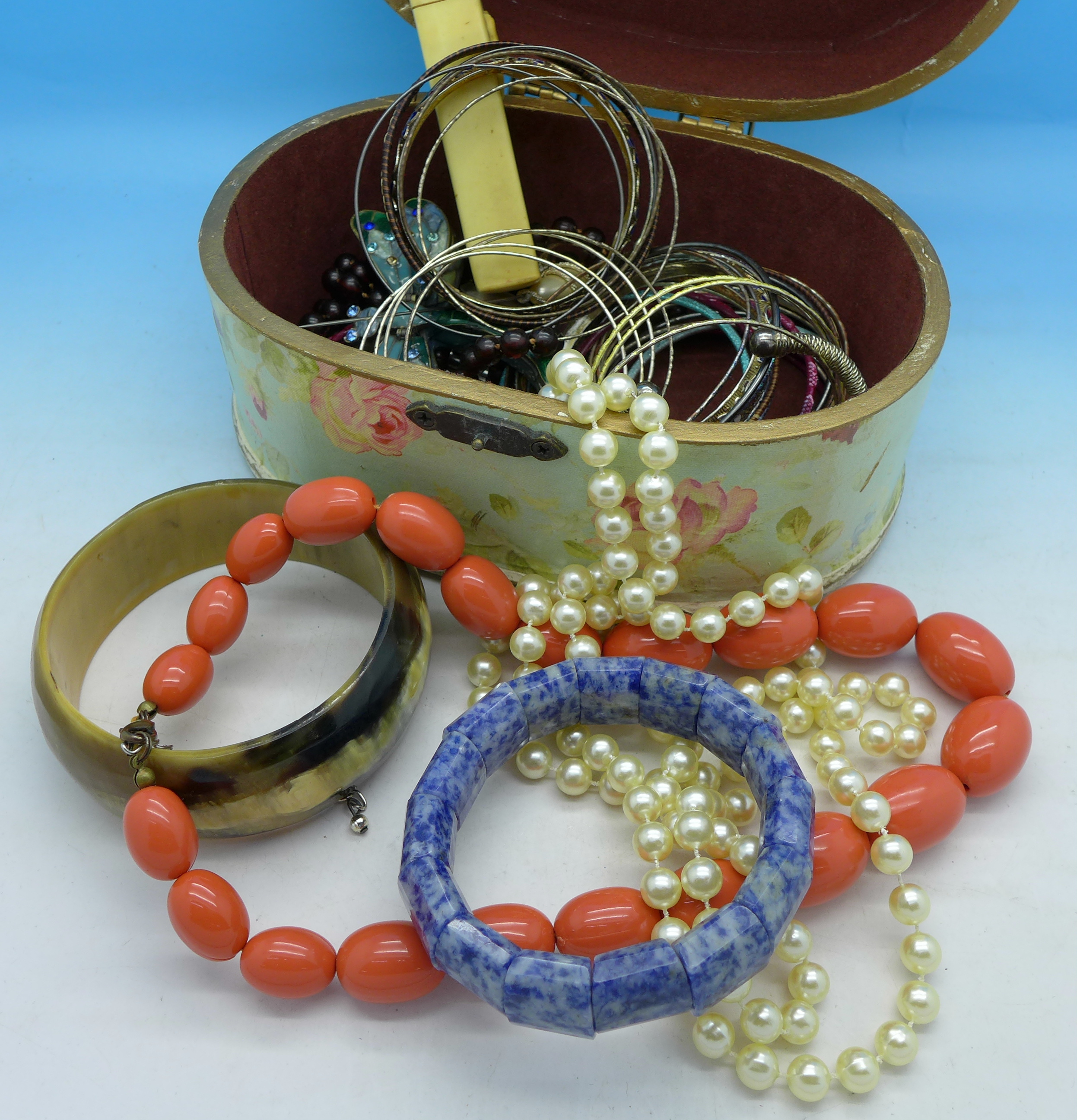 Costume jewellery, horn bangle, etc., total weight 0.