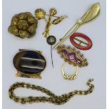 Four brooches, a stick pin, a ring, clasp,