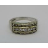 An 18ct white gold, three row diamond ring, 6g,