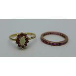 A 9ct gold, opal and ruby ring, 1.6g, O, and a yellow metal and ruby eternity ring, 1.