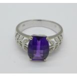 An 18ct white gold, amethyst and diamond dress ring, 4.