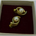 A pair of 9ct gold and pearl earrings, 2.
