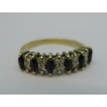A 9ct gold, sapphire and white stone ring, 2.