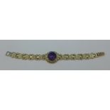 A silver and amethyst set bracelet