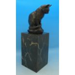 A bronze cat marked Barye, on a marble stand,