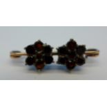 A 9ct gold and garnet brooch, Chester 1922, 2.