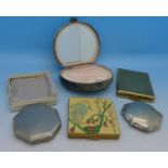 Five compacts including reptile skin and Vogue