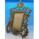 A gilt metal photograph frame,