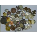 A collection of sport fob medals and other medallions and fobs